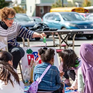 Malden Reads Steering Committee Member Linda Zalk read to some children on Saturday.