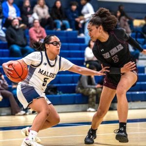 Malden’s Ina Tolete (#5) looks for an opening. (Advocate Photo/Henry Huang)