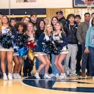 got together for a photo on Senior Night at the Finn Gym.
