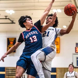 Revere sophomore Nico Cespedes (13) played tight defense on Malden junior Kaua Fernandes Dias Valadares (21) on Saturday.