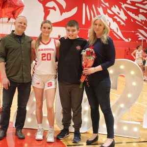 Amelia Pappagallo was escorted by her father Mike, her mother, Val, and her brother, Alex. The four-year player plans to travel the world with her teammate, Devany Millerick, after she graduates from high school.