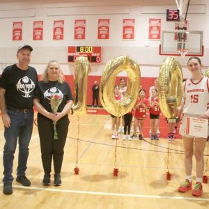 A GRAND MOMENT: Shown celebrating Peyton’s 1,000th point, from left: brother Ronald, father Ronald, mother Jennifer, Peyton and sister Ariana DiBiasio during last Thursday’s girls’ basketball game at Saugus High School. (Advocate photo by Tara Vocino)