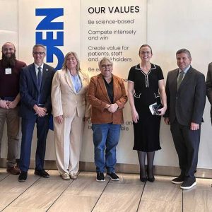 Senator Sal DiDomenico (third from right) with State House colleagues and Amgen leaders.