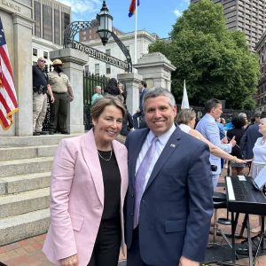 Senator Sal DiDomenico with Governor Maura Healey in front of the State House