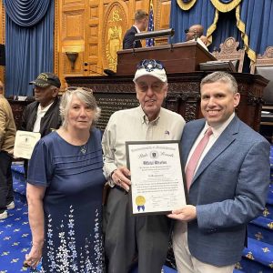 State Senator Sal DiDomenico presenting a State Senate Official Citation to his honoree, Ron Keohan, in the State House Chamber.