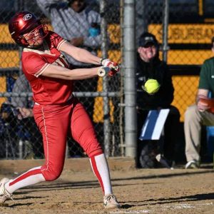 Everett High School junior catcher Emilia Maria-Babcock, shown swinging away during a game last April, returns as the team’s new starting catcher this year. The Tide will begin the GBL season on Wednesday, April 3, at Chelsea’s Carter Park, beginning at 4 p.m.  (Advocate File Photo)
