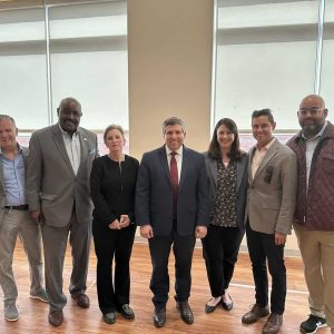 Pictured from left to right: State Representatives Brian Ashe, Bud Williams and Marjorie Decker and State Senators Sal DiDomenico, Robyn Kennedy, Jake Oliveira and Adam Gomez. (Courtesy Photo)