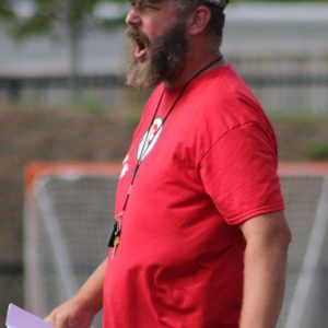 Sachems Head Coach Steve Cummings called out instructions during last year’s scrimmage against Newburyport. (Advocate file photo)