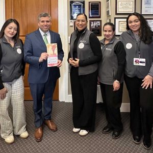 Senator Sal DiDomenico with Early Ed and Care advocates in his office.