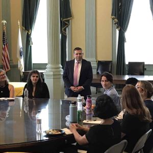 State Senator DiDomenico listening as Civic Action Project fellows talk about their background and interests.
