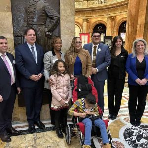 State Senator Sal DiDomenico is pictured with advocates and colleagues, from left to right: Senator DiDomenico, State Representative Dave Rogers, Attorney General Andrea Campbell and, on the far right, Health Care For All Executive Director Amy Rosenthal.
