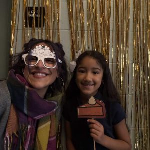 A.C. Whelan 2nd grader Gabriela De Los Santos and her mom, Marcela, posing in the photo booth at the 2nd Grade Family Thanksgiving Breakfast.