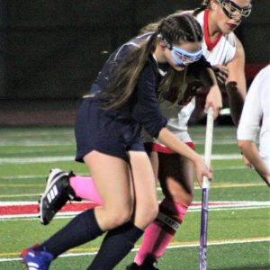 Revere defender Ana Kalliavas is shown battling for control of a loose ball during a game against Saugus last season. (Advocate file photo)