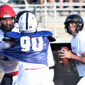 South guard Elmahdi Elkaouakibi of Revere protects for quarterback Jesse Maggs of Lynn English on Wednesday.