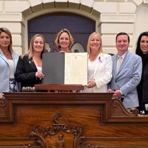 State Rep. Giannino, Senator Patrick O'Connor, Ruth Hoffman (CEO of ACCO), and three mothers of affected families at the Pediatric Cancer Advocacy Day in the Senate Reading Room at the Mass. State House.
