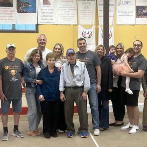 First-place winners Bocce Bad A’s, second-place winners The Rioneros and Orange Rose Foundation members