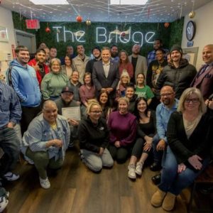 Mayor Gary Christenson (center) with Recovery Coach graduates.