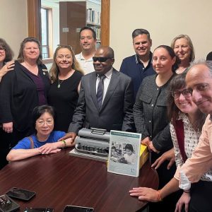 Mayor Gary Christenson and Malden Disability Commission Members were in attendance as Malden Lions Club members presented a braille typewriter to the Malden Public Library.