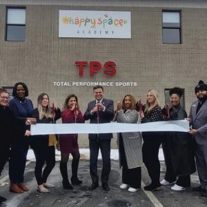 Pictured from left to right (holding scissors): Shawna Shelton, Maria Difiore, Mayor Gary Christenson, business owner Rosali Ngwanyam, Leah Smith and Joana Arias.