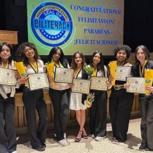 Several recipients of the Massachusetts State Seal of Biliteracy stand together. From left to right are Brianny Muneton, of Revere; Tatianna Lazo, of Revere; Nayeli Marquez, of Chelsea; Luz Estrada, of Chelsea; Josseline Munoz, of Chelsea; Deborah Souza, of Reading; and Andrea Diaz, of Revere. (Photo Courtesy Northeast Metro Tech)