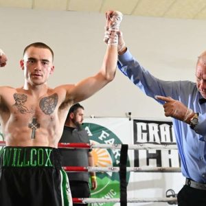 Shea Willcox had his arm raised in victory by referee Jack Morrell. (Photo Courtesy of Emily Harney / Fightography)