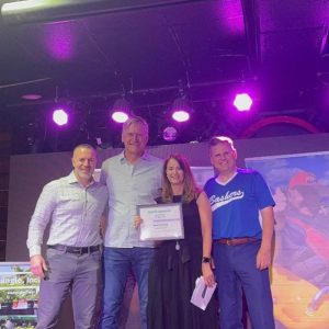 From left to right: Triangle Board of Directors President Michael, Triangle Board Member Henri — the recipient of the Community Partner Award, Triangle CEO Rachel and Malden Mayor Gary Christenson.
