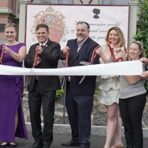 Shown from left to right: Mystic Side Opera Executive Director Robert Crawford, opera singer Natalja Sticco, Mayor Gary Christenson, Mystic Side Opera General Director & CEO Gene Sticco, opera singer Danielle Pribyl, Ward 3 Councillor Amanda Linehan and opera singer Wesley Thomas prepared to the cut the ribbon at the Mystic Side Opera on Monday night.