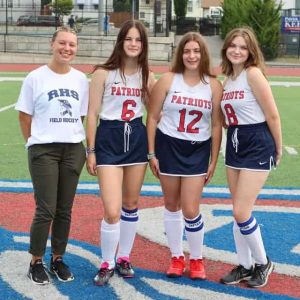 TEAM LEADERS: Shown from left, Coach Alex Butler, with captains Ana Kalliavas, Bella Stamatopoulos and Jordan Martelli.