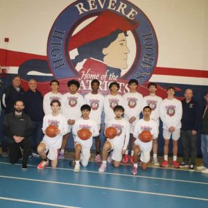 Revere High Boys’ Varsity Patriots — Front row, shown from left to right: State Rep. Jeffrey Turco, Assistant Coach Alex Green, Athletic Director Frank Shea, Assistant Coach Bill Sullivan, Global terminal manager Mike Lally, Domenic Belmonte, Joshua Mercado, Sami Mghizhou, Avi Lung, Head Coach David Leary, Ward 2 City Councillor Ira Novoselsky, Police Activities League Director Kris Oldoni, and Assistant Coach John Leone. Back row, shown from left to right: Captain Andrew Leone, Erick Mayorga, Sean Burnett, Ryan El Babor, Amir Yamani, Captain Luke Ellis, and Ethan Day.