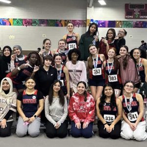 GBL CHAMPS: The Revere High School Girls Track Team after its Greater Boston League championship meet victory at the Reggie Lewis Center in Boston. Shown kneeling left to right: Kawtar Lhaz, Jocelyn Laz, Manal Hazimeh, Ava Cassinello, Lesly Mendoza, and Dayana Ortega. Middle, left to right: Coach Noelle MacDonald, Valeria Sepulveda, Mayaah Ndi, Fatima ElHariri, Rania Hamdani, Francoise Kodjo, Caleigh Joyce, Zizi Kalliavas, Jaliyah Manigo, Gigi Zierten, Gianna Chiodi, Neyla Vranic, Ashley Cabrera Rodriguez, and Coach Racquel MacDonald-Ciambelli. Shown back row, left to right: Danni Hope Randall, Gemma Stamatopoulos, Olivia Rupp, Liv Yuong, Basma Sahibi, Hiba El Bzyouy.