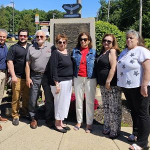 Relatives of Army Staff Sergeant Arthur Frederick DeFranzo stand in front of the Medal of Honor Monument across the street from the VFW Post 2346 Hall named in his honor. From left to right are Gary Walsh, of Wilmington; Sean Walsh, of Atkinson, N.H.; Arthur DeFranzo, of Hampstead, N.H.; Marilyn Felice, of Saugus; Linda Call, of Saugus; Joanne Olsen, of East Hampstead; and Jane Himaras, of Saugus. (Saugus Advocate photo by Mark E. Vogler)