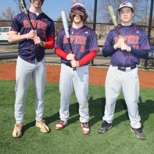 Seniors, shown from left to right, are: Captain Kyle Cummings, Captain Ollie Svendsen, and Chase Smith during their game on Patriots’ Day against the Malden High School Golden Tornadoes Varsity Boys’ Baseball Team at Rotondi Field.