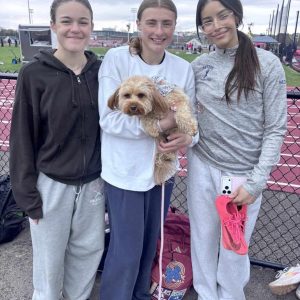 Pictured from left to right: Zizi Kalliavas, Gemma Stamatopoulos and Basma Sahibi, along with Honey Stamatopoulos, the team’s good luck charm.