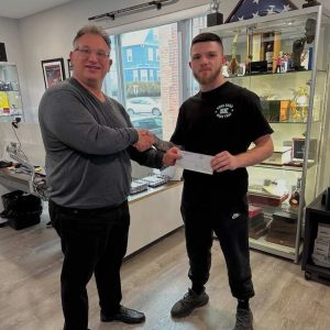 Everett business owner Rocco Longo, owner of Sabatino Insurance Agency, is sponsoring 21-year-old Nick Rossi, a promising Muay Thai fighter from Everett.