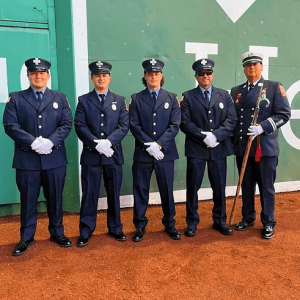 SAUGUS FIRE DEPARTMENT AT FENWAY: Members of the Saugus Firefighters honor guard appeared at Fenway Park this week to present the colors before the National Anthem for a Boston Red Sox game. (Courtesy Photo to The Saugus Advocate)