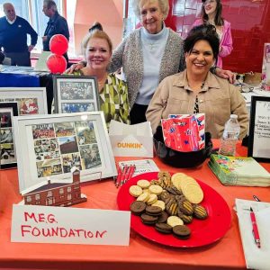 SAUGUS HISTORY AND GIRL SCOUT COOKIES: Members of the MEG Foundation offered a true taste of the town at their table. From left to right are Rhonda Combe, Janice Jarosz and Patty Staples. (Saugus Advocate photo by Mark E. Vogler)