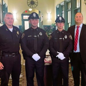 WELCOME TO SAUGUS PD: Left to right: Saugus Police Chief Michael Ricciardelli, Patrolmen Brendan Grocki and Christopher Benoit and Town Manager Scott C. Crabtree Tuesday (July 30) after Grocki and Benoit were sworn in as new Saugus police officers during a ceremony at Saugus Town Hall. (Courtesy Photo to The Saugus Advocate)