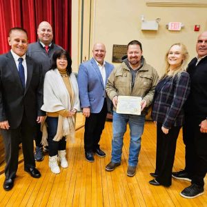 SHOWING THEIR APPRECIATION: The Board of Selectmen presented The Continental Restaurant owner Paul Kourkoulis with a citation at Tuesday’s meeting, commending the restaurant for its 72 years of service to the community. Pictured from left to right are Selectman Michael Serino, Town Manager Scott C. Crabtree, Selectman Corinne Riley, Board of Selectmen Vice Chair Jeff Cicolini, Continental owner Kourkoulis, Board of Selectmen Chair Debra Panetta and Selectman Anthony Cogliano. (Saugus Advocate photo by Mark E. Vogler)