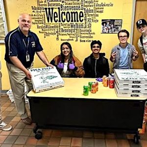 The award-winning Malden High School Speech and Debate Club held its first fundraiser of the year on Tuesday, a Pizza and Soda Sale. On hand to support the club members’ successful efforts were, from left, club advisor and MHS educator Curtis Scheer and Malden High Principal Chris Mastrangelo. (Advocate Photo)