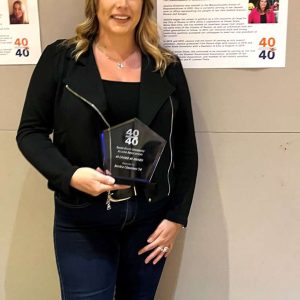 State Representative Jessica Giannino is shown with her 40 Under 40 Award presented to her at a recent ceremony at Salem State University.