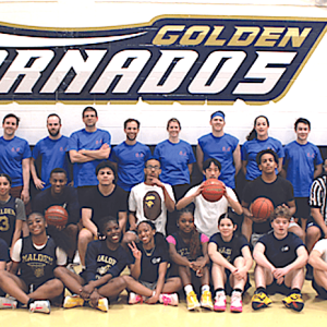 STUDENT-FACULTY GAME: The students, led by senior Ezechiel Noelsaint, broke a four-game win streak by the teachers in the annual Student-Faculty Game. (Courtesy Photos/Malden High Blue and Gold/Nathan Dean)