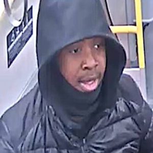 MBTA Police are seeking to identify of one of two persons of interest from a photo taken in an MBTA Orange Line train in connection with an armed robbery at gunpoint at the Malden Center T Station on Sunday, February 19 at 4:45 p.m. (Courtesy/ MBTA Police)