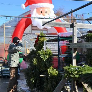 Santa Claus presides over wreaths-2