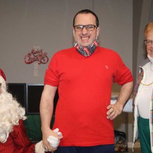 Margaret Johnson and her grandson, Stephen Prizio, with Santa, during Sunday’s League for Special Needs Christmas Party at the Beachmont Veterans of Foreign Wars.