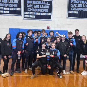 The Saugus/Peabody wrestling team shown after capturing the Northeastern Conference/Cape Ann League championship, shown from left to right: Standing: Coach Wayne Moda, Brooke Diaz, Saugus; Cesar Cruz, Saugus; Jake Murray, Saugus; Landon Rodriguez, Peabody; Lukas Fondulis, Saugus; Jaden Ceac, Peabody; Justin Bremberg, Saugus; Anthony Carnacione, Peabody; Anna Felicio, Saugus; Antonio Anzalone, Peabody; Jackson Deleidi, Peabody; Tucker Landry, Saugus; Evan Johnson, Peabody; Coach Tom St. Cyr, Saugus; and Addy Merrill, Peabody; kneeling: captains Max LoRusso of Saugus and Michael Maraio of Peabody. (Courtesy photo)