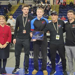 Saugus-Peabody Wrestling: Celebrating the MIAA Sportsmanship Award for Saugus-Peabody wrestling are, left to right, Saugus High School Principal Dr. Carla Scuzzarella, Assistant Coach Tom St. Cyr, Captain Mike Maraio of Peabody, Head Coach Wayne Moda and Saugus Athletics Director Matt Serino.