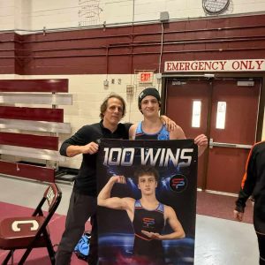 Saugus-Peabody wrestling coach Wayne Moda and Max LoRusso (Advocate photo)