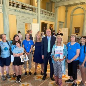 State Senator Jason Lewis (center) and anti-plastic waste advocates.