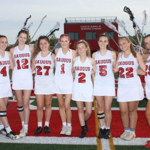 Lady Sachem Seniors, pictured from left to right: Co-Captain Elise Rego, Co-Captain Kali Penachio, Samantha Valley, Amanda DeFronzo, Sophia Scalisi, Co-Captain Georgia Fiore, Emily Orent and Tayla Walsh during last Wednesday’s Girls’ Varsity Lacrosse Senior Night.