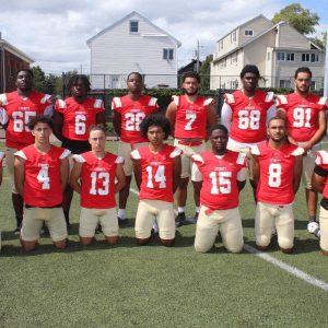 TIDE SENIORS: Standing, shown from left to right, are: Christopher Ruiz, Mark Sylvain, Fabrice Michaud, David Roseme, Kevin Diaz, Marvin Desruisseaux, Alex Linhares, and Head Coach Justin Flores; Kneeling, shown from left: Emanuel Santiago, Elijah Lassiter, Lucas Brito, Carlos Rodrigues, Christ Vernet, Yariel Ortiz, and Omarian Ayala. (Advocate photos by Tara Vocino)